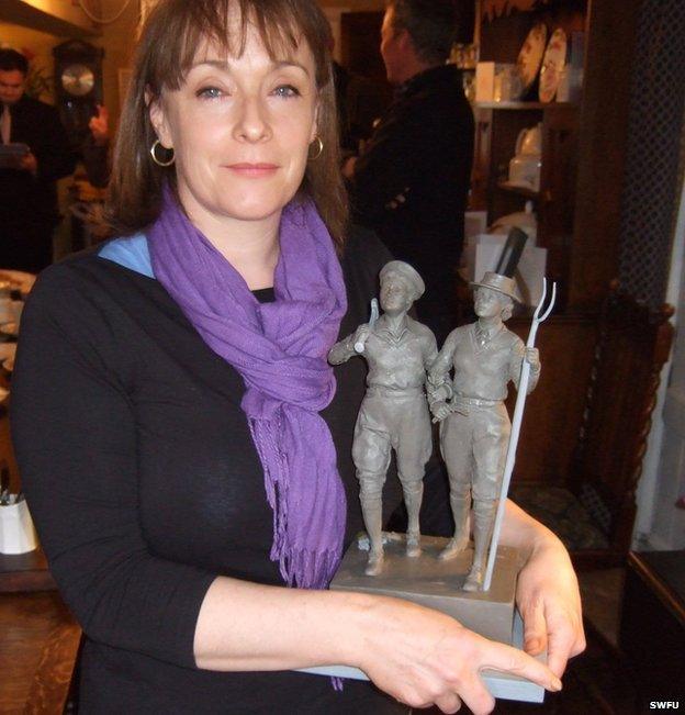 Denise Dutton and clay maquette