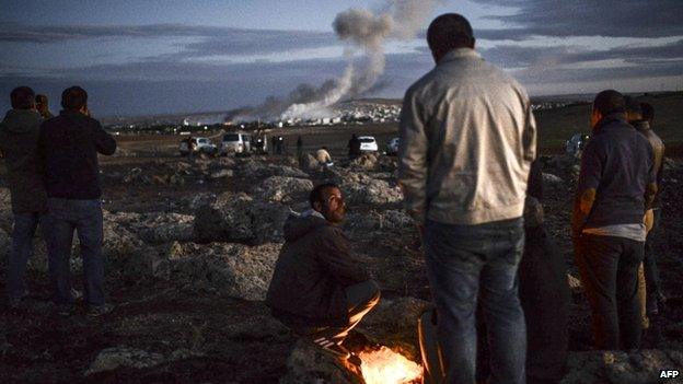 Kurds watch fighting in Kobane from across the border in Turkey - 20 October