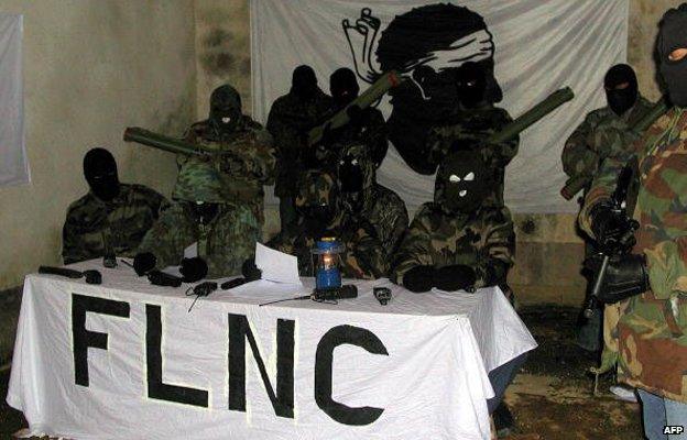 FLNC members brandishing weapons in 2004