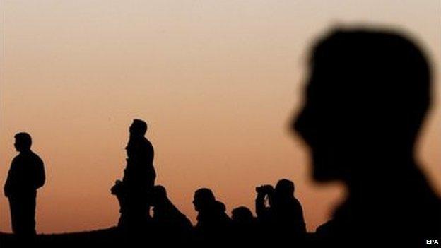 Kurds watch fighting in Kobane from across the Turkish border - 20 October