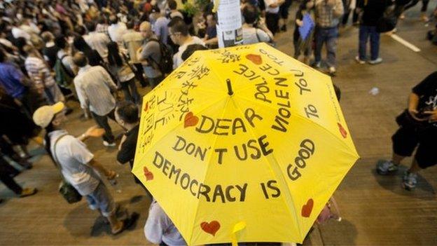 Pro-democracy protesters gather to discuss politics in the street in Mong Kok, Kowloon, Hong Kong, China, 20 October 2014.