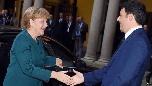 Matteo Renzi with Germany's Chancellor Angela Merkel in Milan (17 Oct)