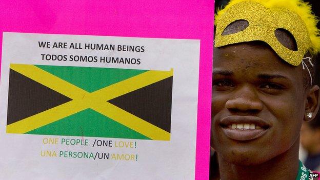 A member of Jamaica's gay community takes part in a march against stigma, discrimination and homophobia, in Mexico City, on August 2, 2008