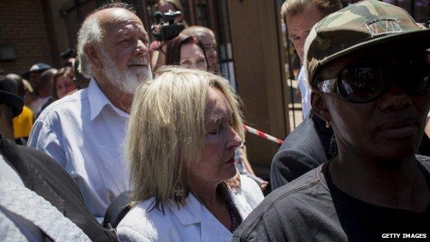 June and Barry Steenkamp leave the high court in Pretoria, South Africa on 21 October 2014