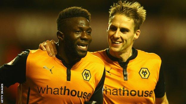 Bakary Sako of Wolverhampton Wanderers celebrates his goal with team mate Dave Edwards