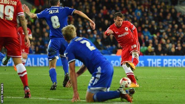 Adam Le Fondre shoots to score Cardiff's third goal against Ipswich