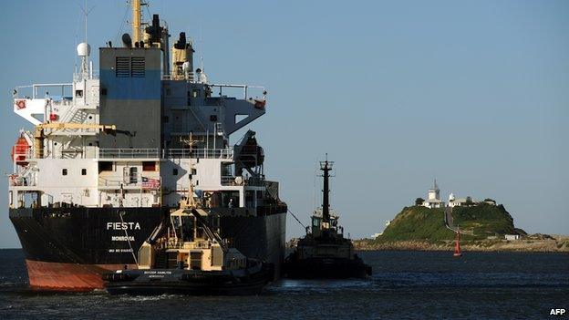 This photo taken on 25 April 2012 shows a bulk carrier leaving the port of Newcastle in Australia's New South Wales state