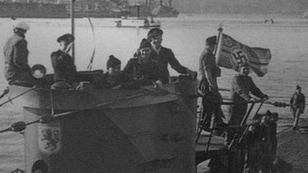 Crew of the German U-boat 576 on the deck of their submarine