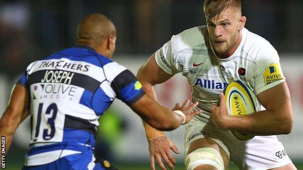 Bath centre Jonathan Joseph prepares to try and tackle Saracens lock and fellow England squad member George Kruis