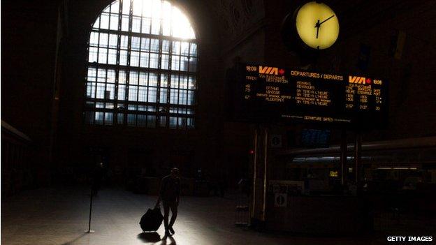 A commuter walks through Union Station, the heart of VIA Rail travel, on April 22, 2013 in Toronto, Ontario, Canada. The Royal Canadian Mounted Police (RCMP) report they have arrested two people connected to an alleged Al Qaeda plot to detonate a bomb on a VIA Rail train in Canada.