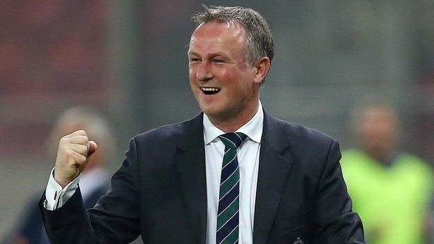 Northern Ireland manager Michael O'Neill shows his delight during his team's 2-0 win over Greece in Athens