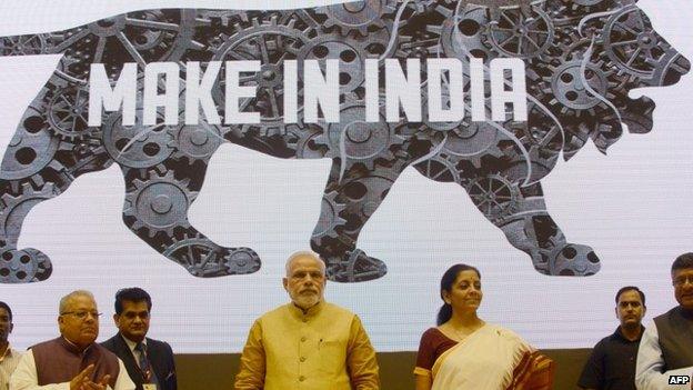 ndian Prime Miniser Narendra Modi (C) launches the "Make In India" project as Minister for Commerce and Industry Nirmala Sitaraman looks on in New Delhi on September 25, 2014