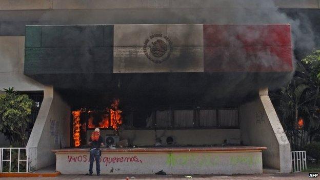 View of the municipal palace of Iguala after unknown men set it on fire on 22 October, 2014.