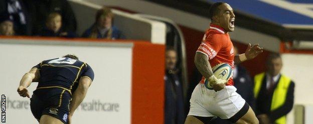 Fetu'u Vainikolo celebrates on his way through to scoring for Tonga at Pittodrie