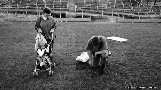 Cutting turf after the final game