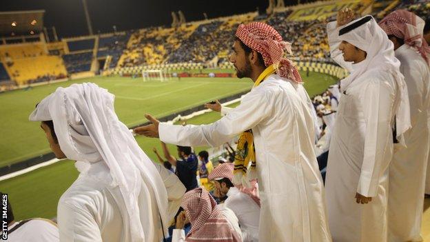 A crowd at a football match in Qatar