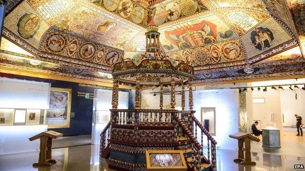 The reconstructed ceiling of the wooden synagogue from Gwozdziec village and Bimah, a platform in the synagogue, as part of the Jewish Town gallery