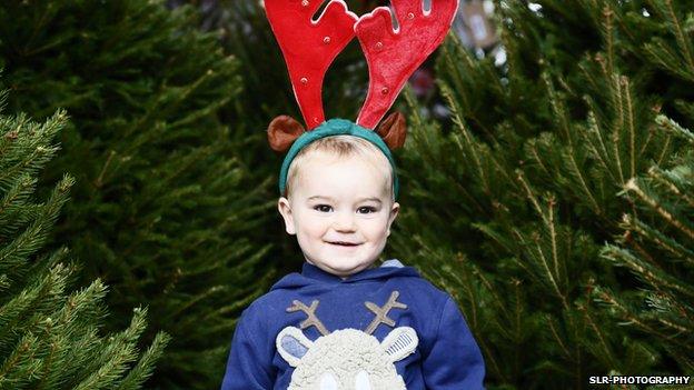 Child at Christmas tree competition