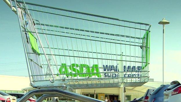 shopping trolley in front of Asda