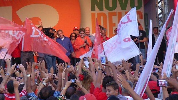 President Dilma Rousseff gives a speech during her rally and is cheered by a crowd in Goiana, in the state of Pernamuco, on 22 October 2014