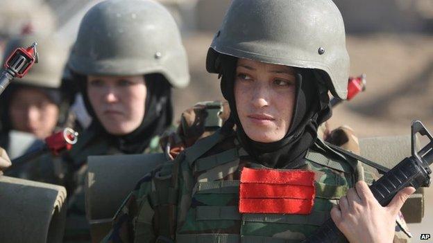 Women soldiers in Afghanistan's National Army stand guard during a military training exercise at Kabul Military Training Center, in Kabul, Afghanistan, 22 October 2014