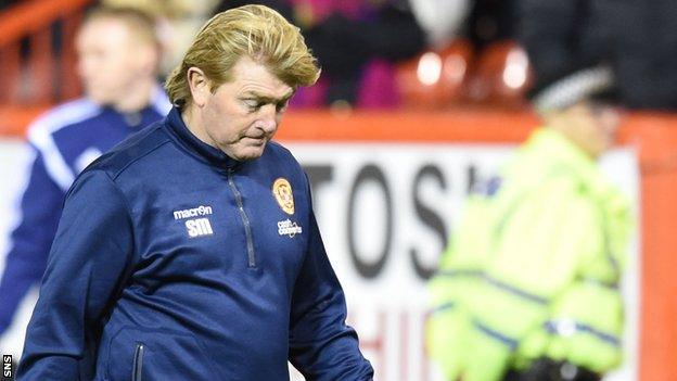 Motherwell manager Stuart McCall looks disappointed