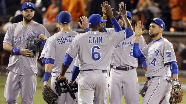 Kansas City Royals celebrate their win in Game Three