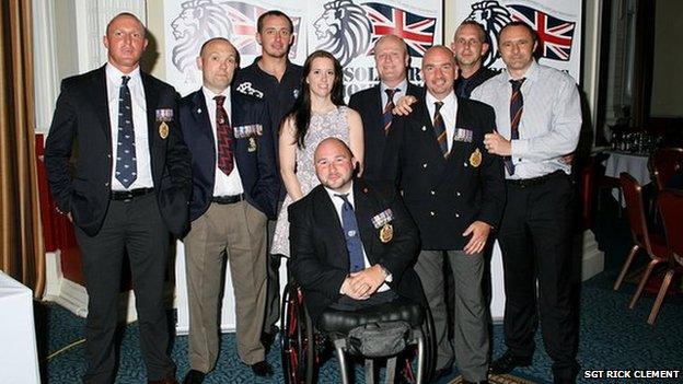Sgt Rick Clement (front) with other serving and ex-members of the armed forces, mostly from the Duke of Lancaster Regiment