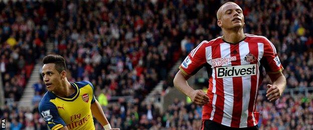 Wes Brown and Alexis Sanchez