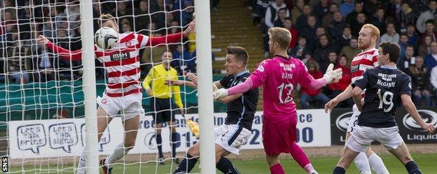 Michael Devlin can only head into the side netting as Hamilton are frustrated on their trip to Dens Park