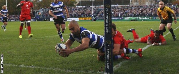 Olly Woodburn is tackled by Vincent Clerc