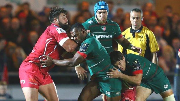 Vereniki Goneva of Leicester is tackled by Scarlets' Rory Pitman