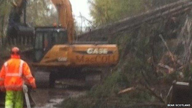 clearing debris on A82