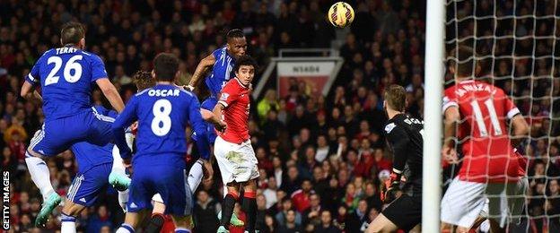 Chelsea's Didier Drogba scores against Manchester United