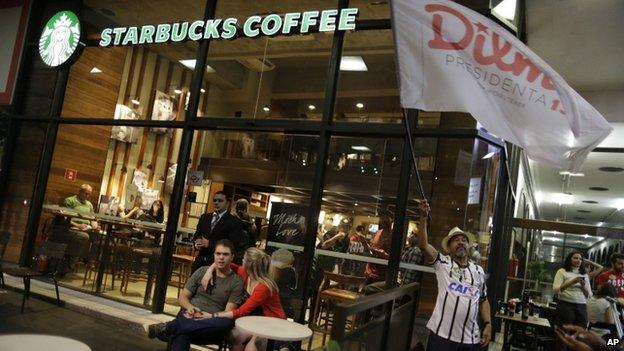 Workers Party supporter outside Starbucks in Sao Paulo 24 Oct 2014