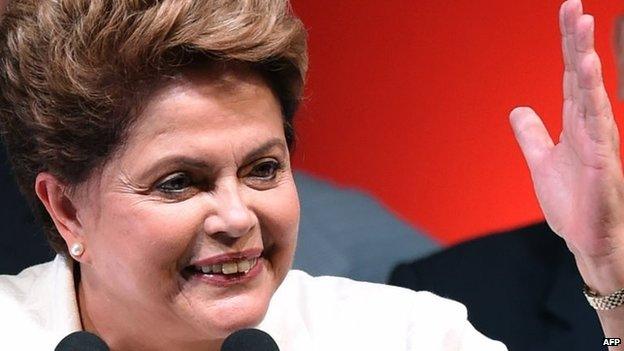 Re-elected Brazilian President Dilma Rousseff delivers a speech following her win in Brasilia on 26 October, 2014.