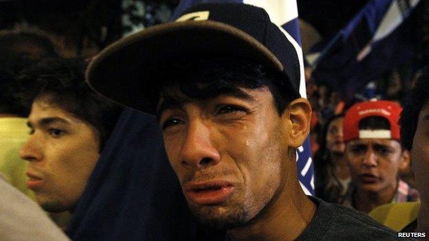 A supporters of Aecio Neves reacts to the results of the elections in Belo Horizonte on 26 October, 2014