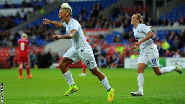 England Women's striker Lianne Sanderson celebrates scoring against Wales.