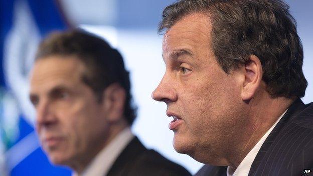 Governors Andrew Cuomo and Chris Christie announce their states's Ebola quarantine policies on 24 October.