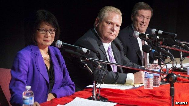 John Tory (right) with Doug Ford and Olivia Chow