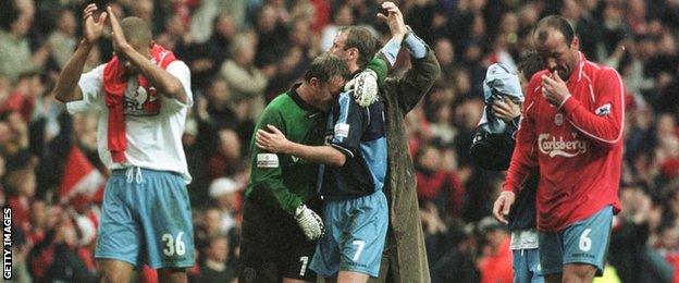 Wycombe players after FA Cup loss to Liverpool