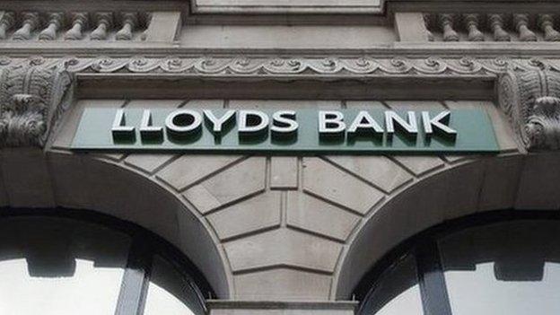 Lloyds sign outside bank branch