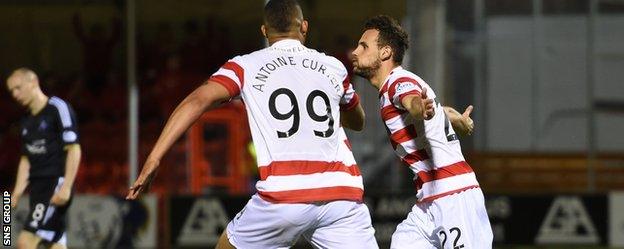 Hamilton's Tony Andreu (22) wheels away having scored against Aberdeen