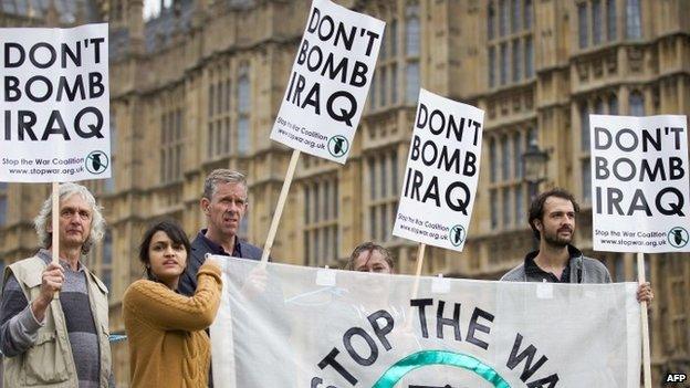 Protesters outside Parliament during a recent debate of UK military intervention in Iraq