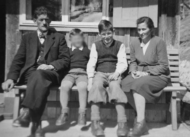 David with his foster family and another unidentified boy