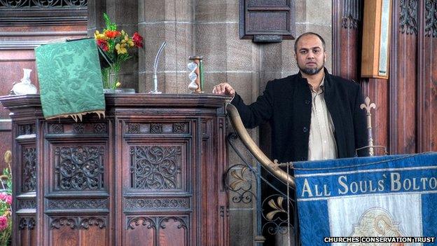Inayat Omarji at the pulpit at All Souls, Birmingham