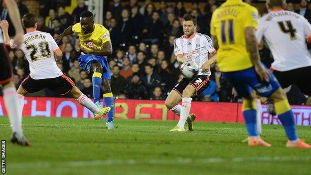 Simon Dawkins scores Derby's third goal