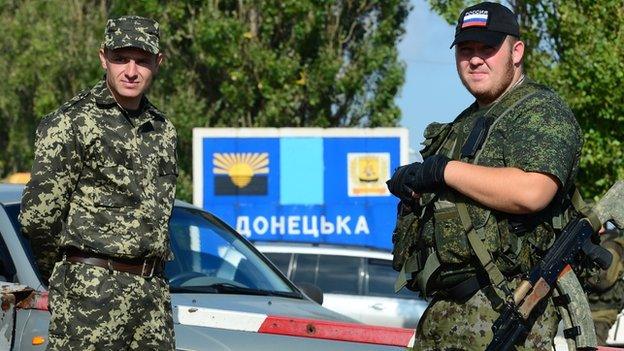 Pro-Russian rebels at Uspenka border post - file pic