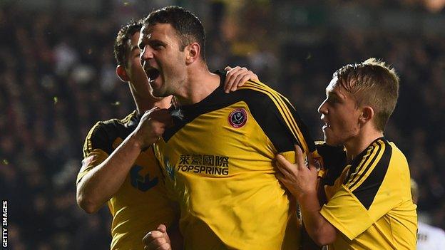 Michael Higdon celebrates his winning goal