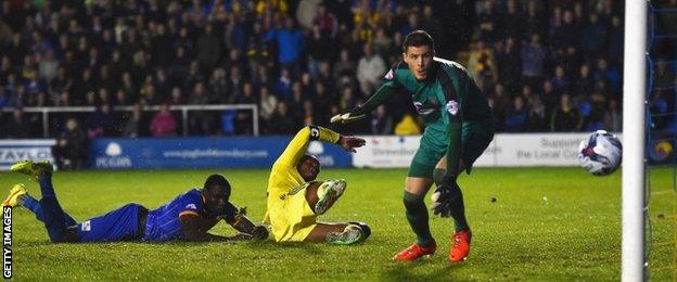 Shrewsbury's Jermaine Grandison scores an own goal